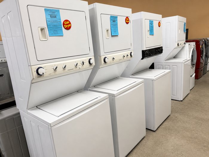 Stacked laundry appliances